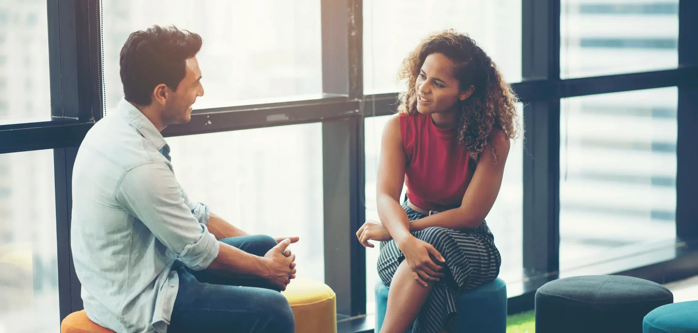 two employees talking about the intranet